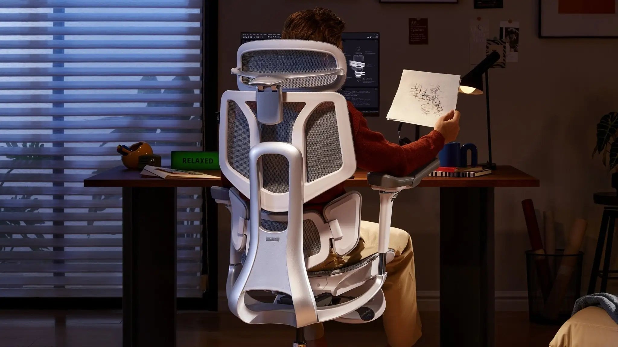 Sturdy five-star base with silent casters on a high-stability ergonomic office chair.