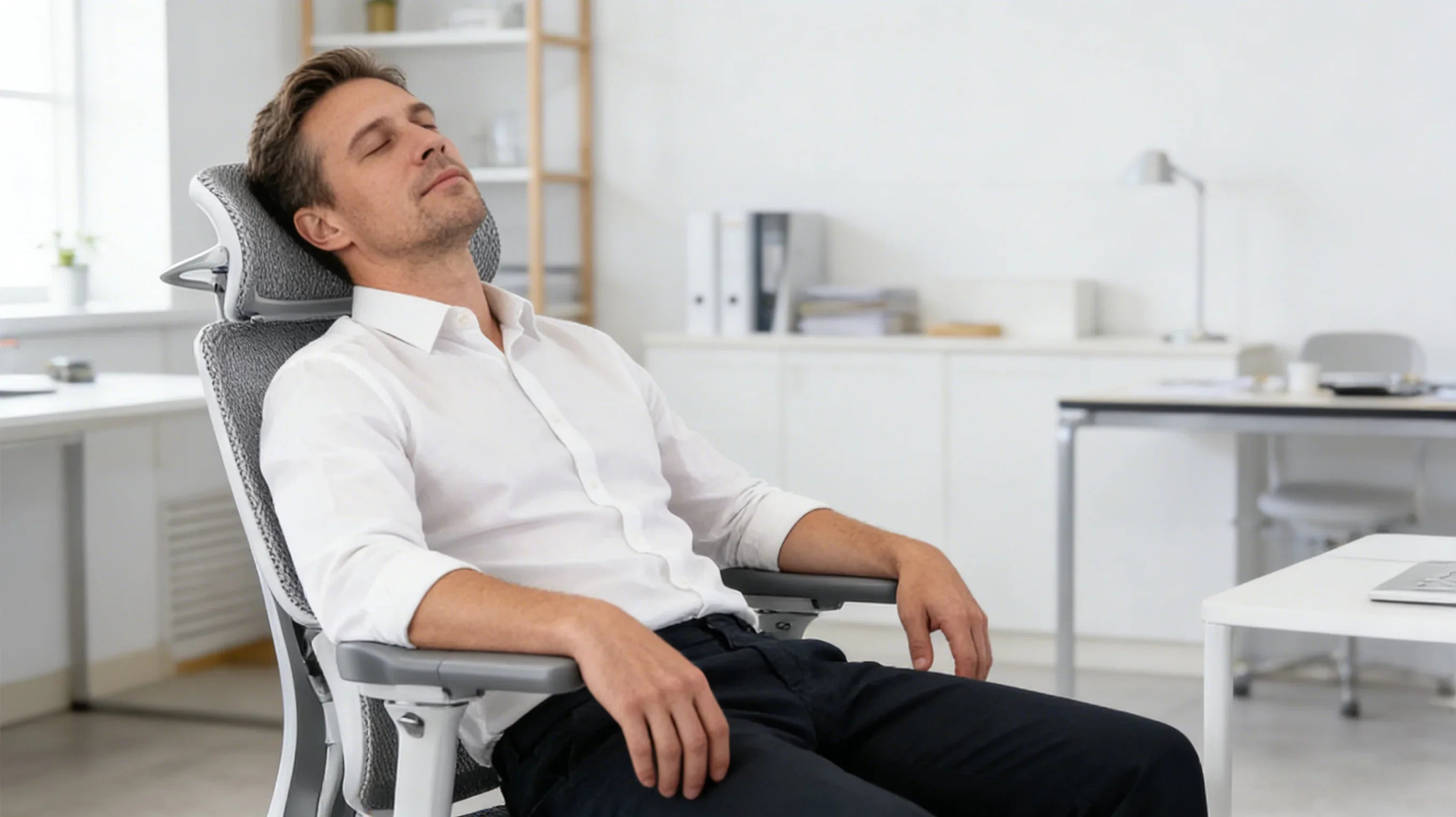 A European health consultant presenting a [**good ergonomic office chair**].