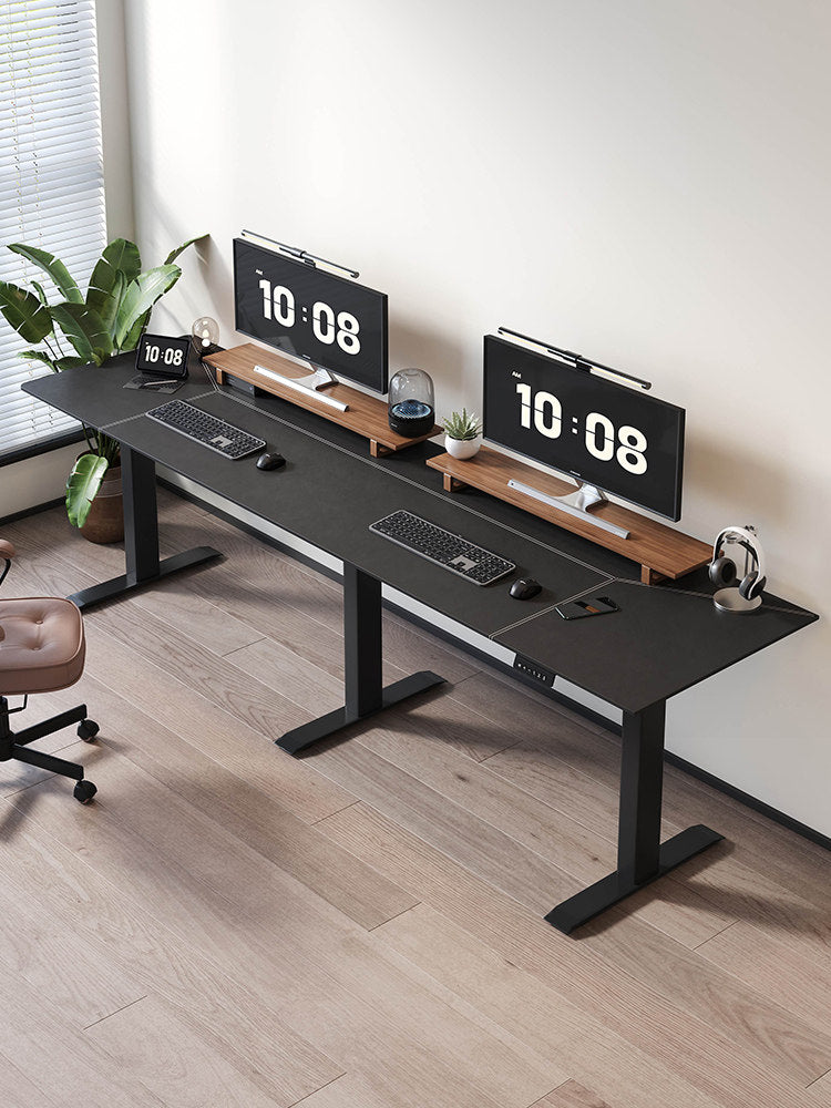 Extra-wide triple-motor standing desk with carbon-fiber pattern top
