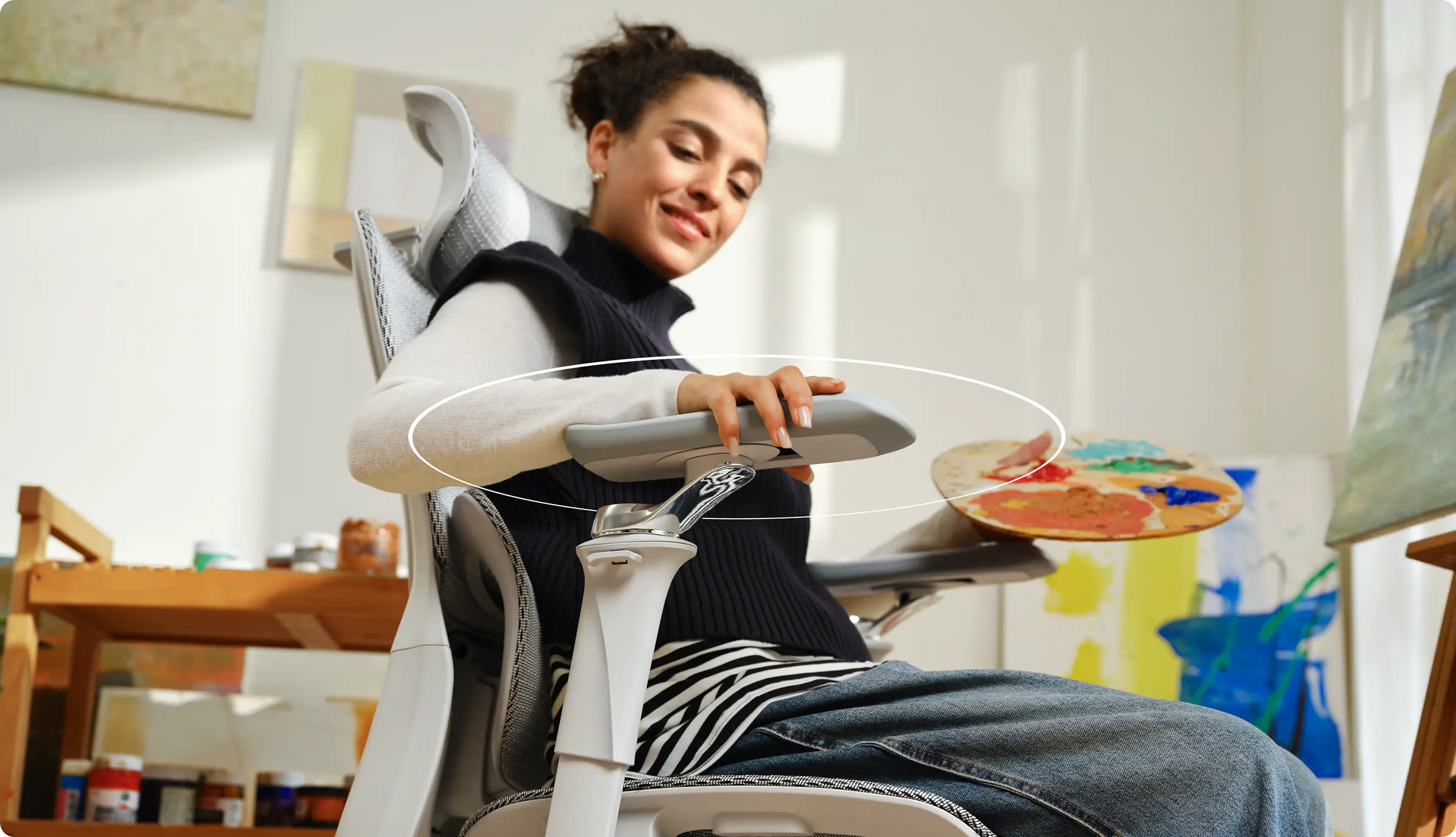 "Move however you please. The armrests of our ergonomic office chair follow your lead, ensuring you’re supported in every position."