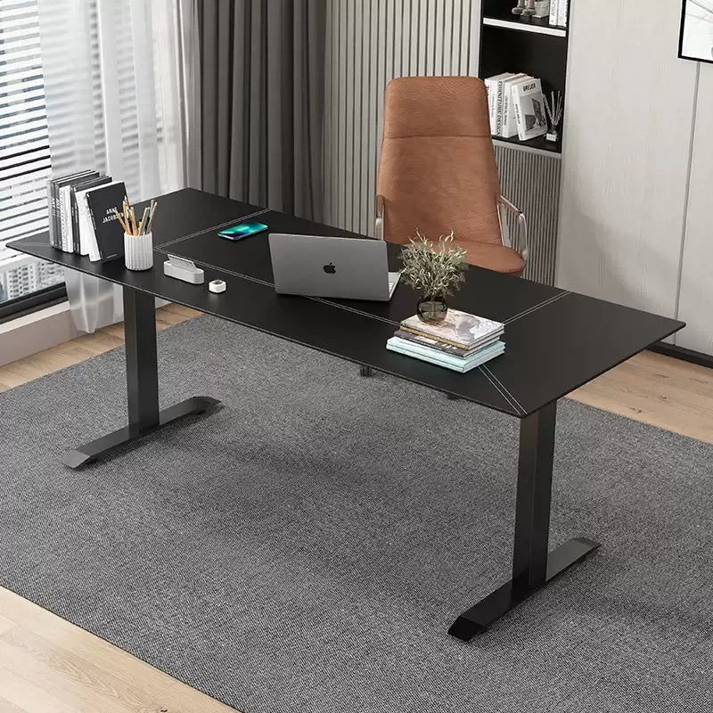 Long three-motor standing desk in a modern shared office