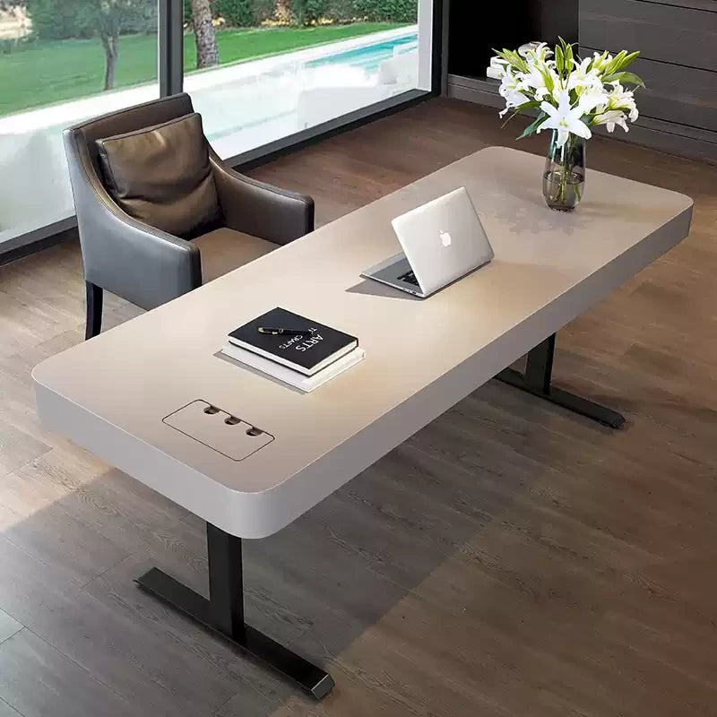 premium gray electric standing desk in a modern home office with wide desktop