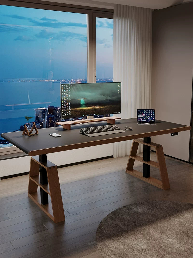 Executive electric standing desk with saddle leather top in a modern home office