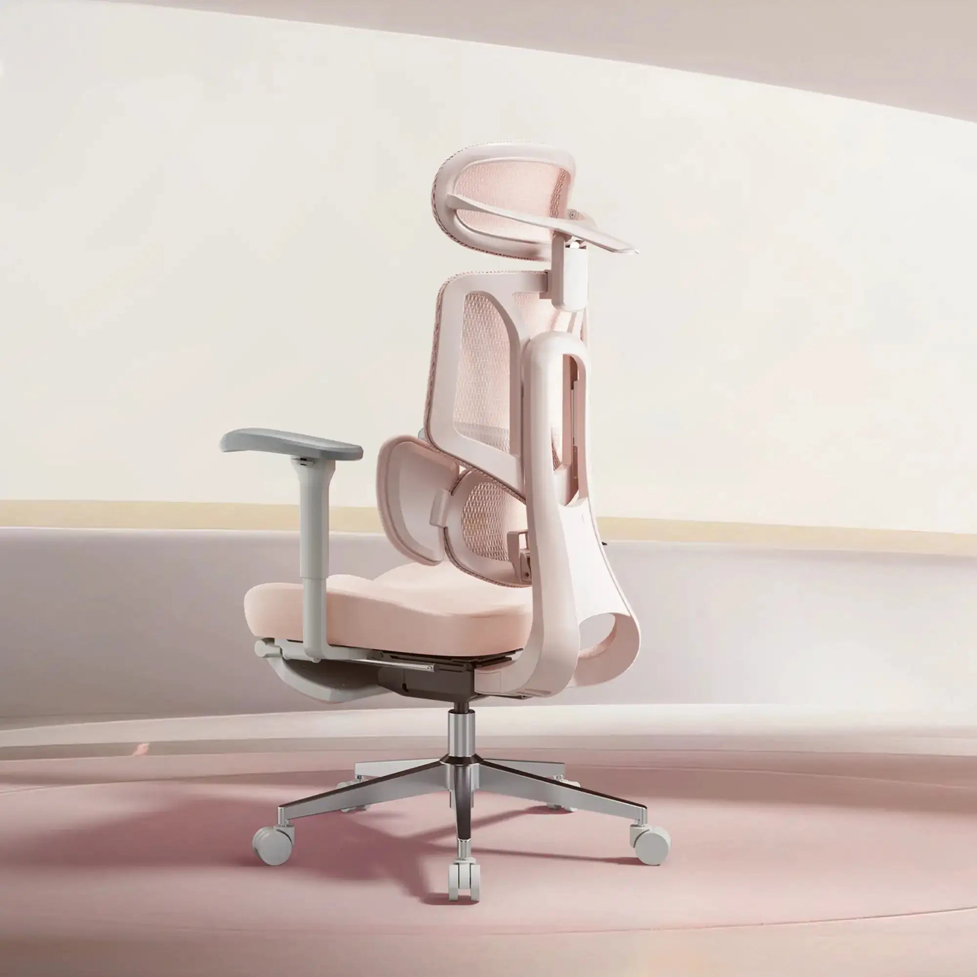 Comfortable pink office desk chair ergonomic swivel design for a modern lady's workspace.