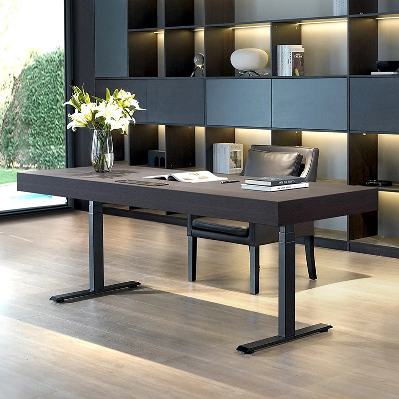 Italian dual motor electric standing desk in smoked wood home office setting