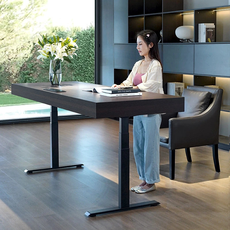 Italian electric standing desk side profile in a modern office