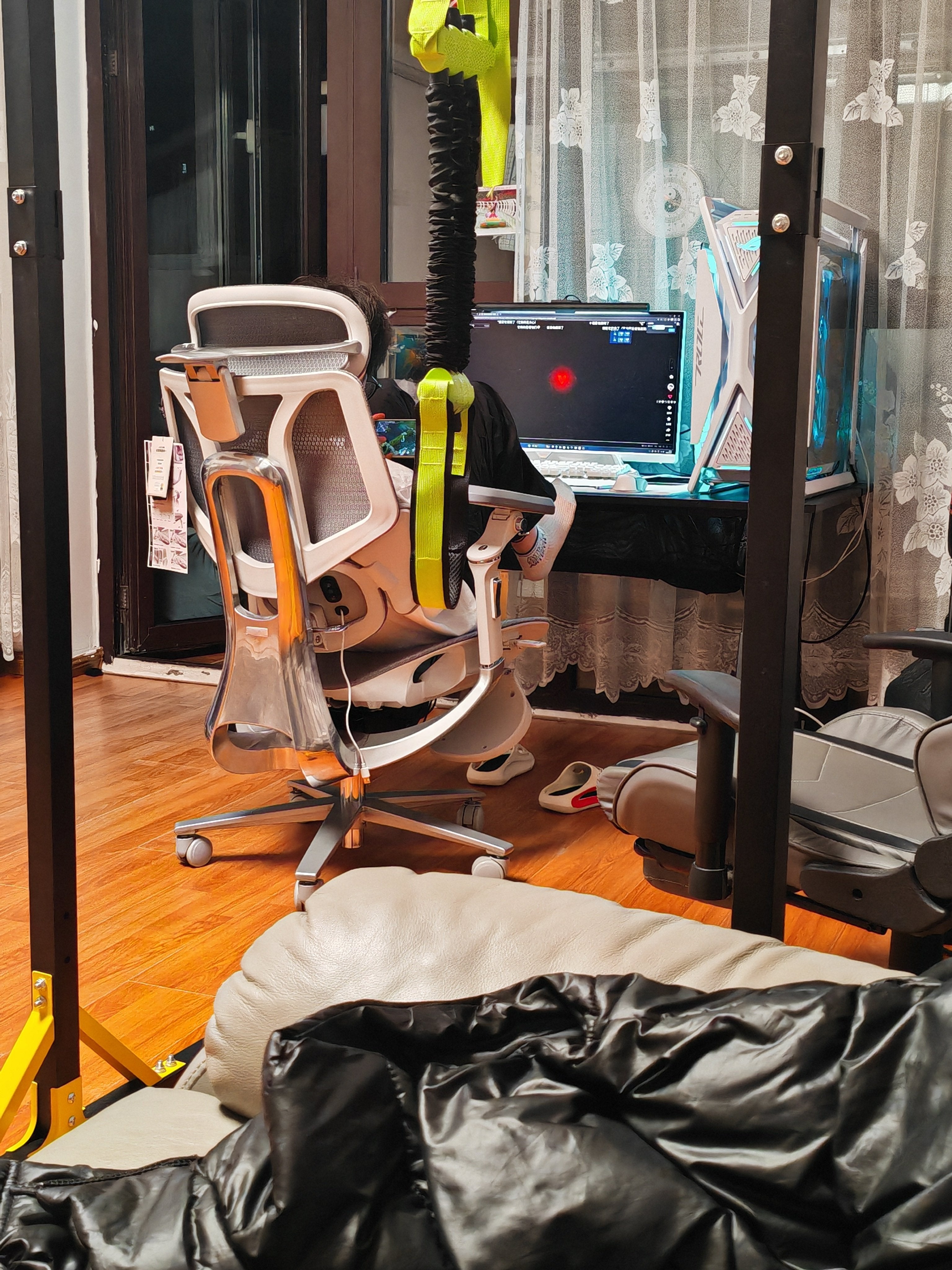 Advanced lumbar support system of an ergonomic office chair designed to maintain natural spinal curvature and reduce lower back pain.