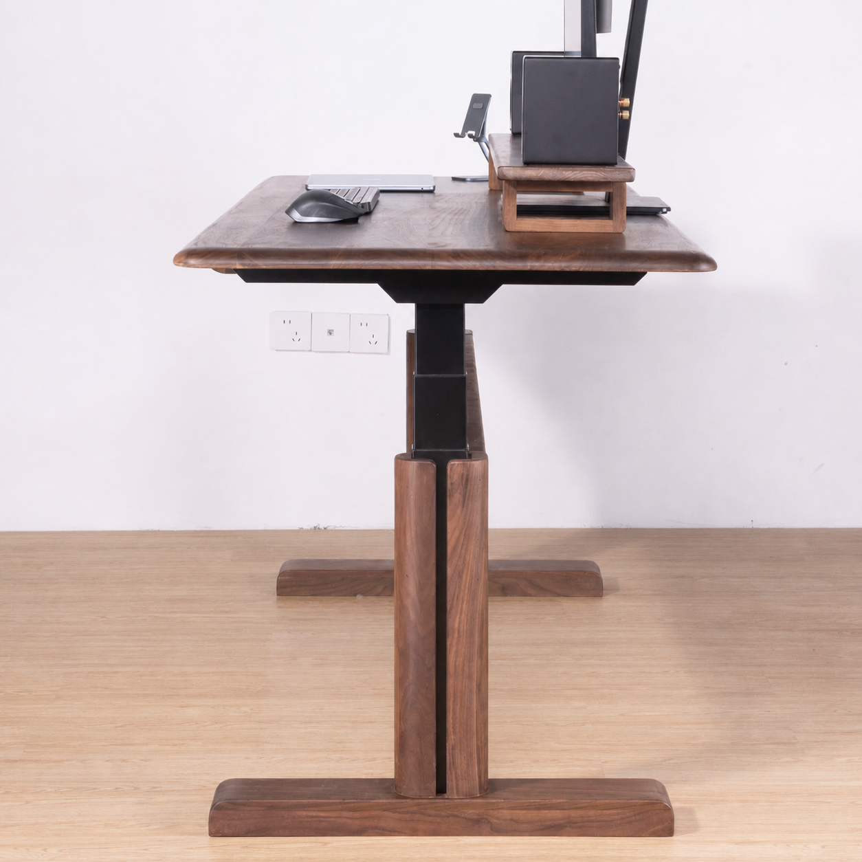 Premium Solid Walnut Wood-Wrapped Dual-Motor Standing Desk raised side view