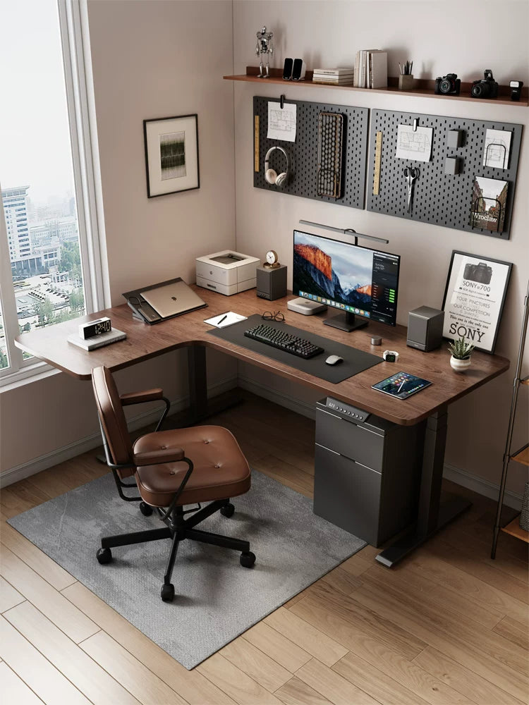 Walnut finish L-shaped electric standing desk in a home office
