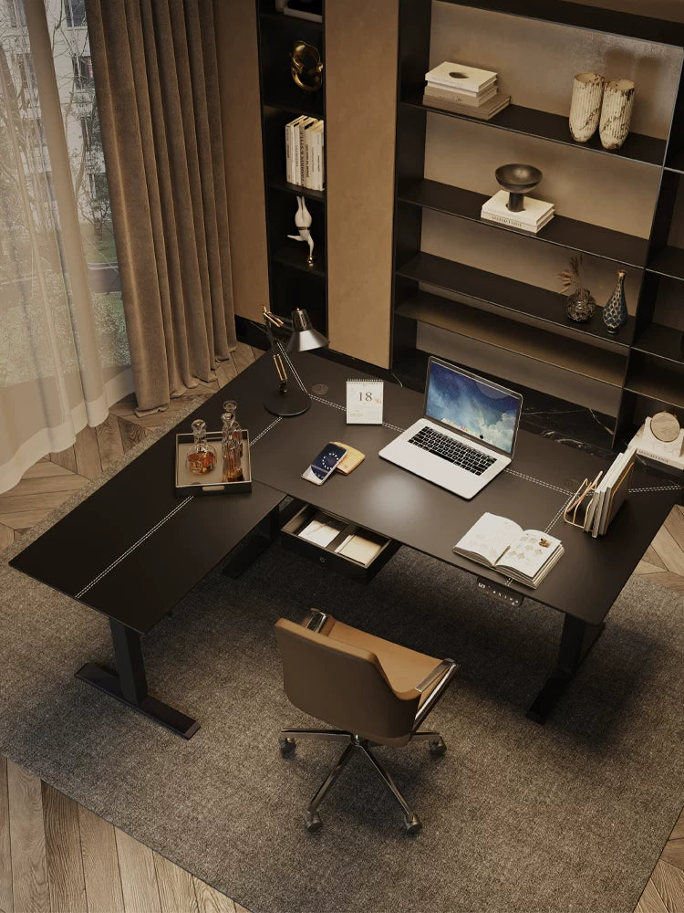 Black saddle leather L-shaped electric standing desk viewed from above