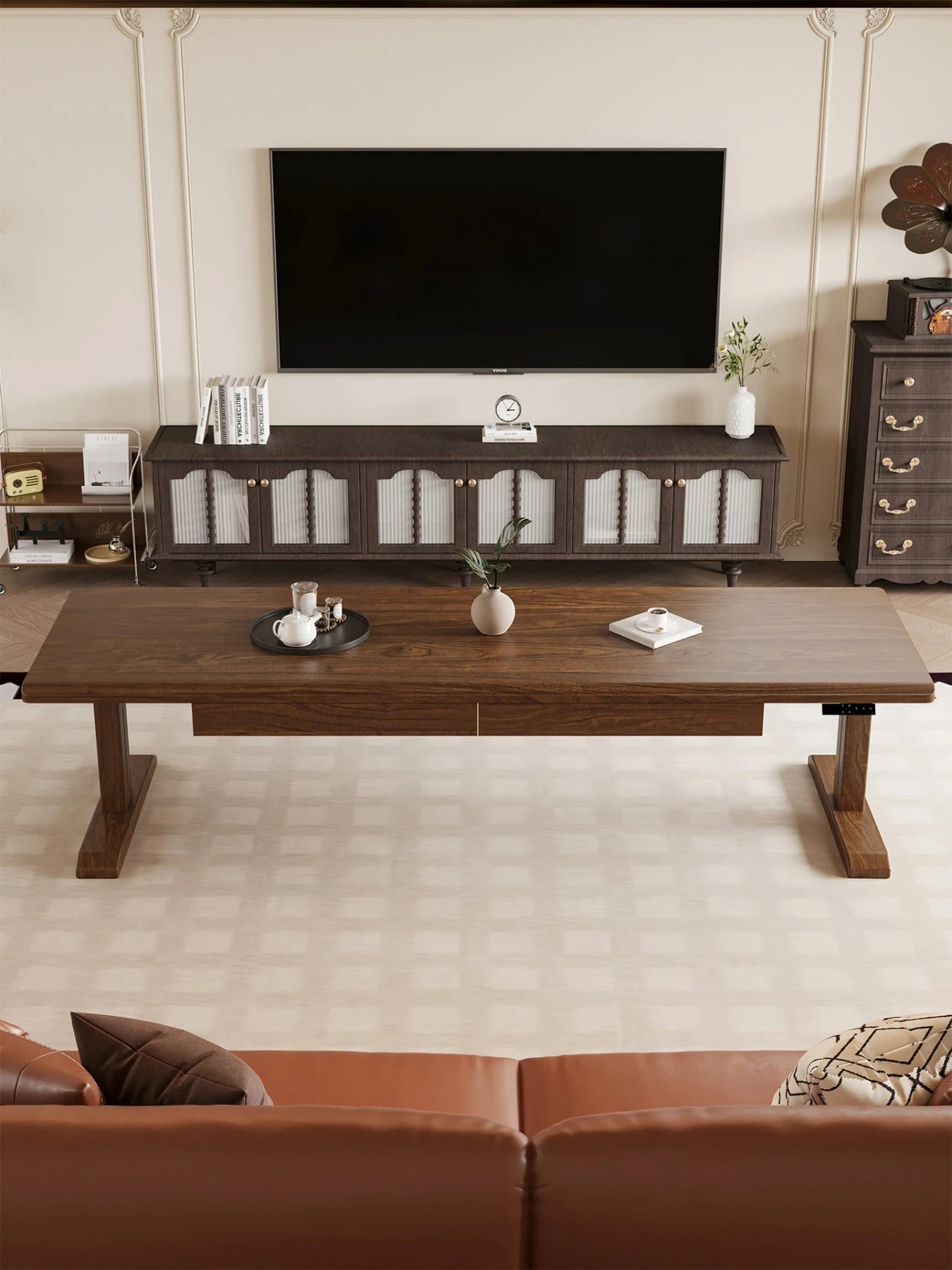 MCT10 solid wood electric standing desk in a modern living room