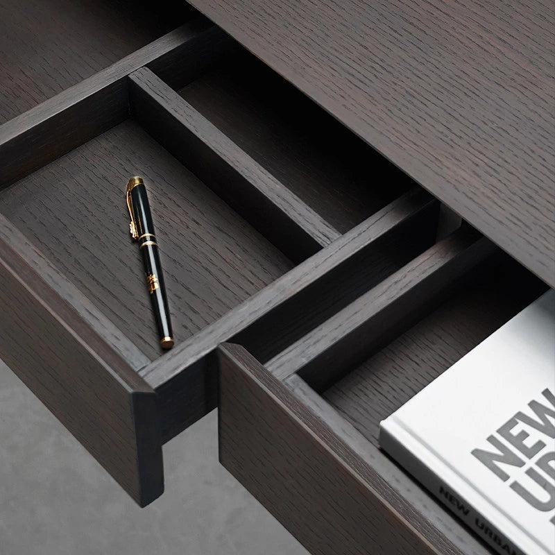 Minimal electric standing desk in a modern workspace