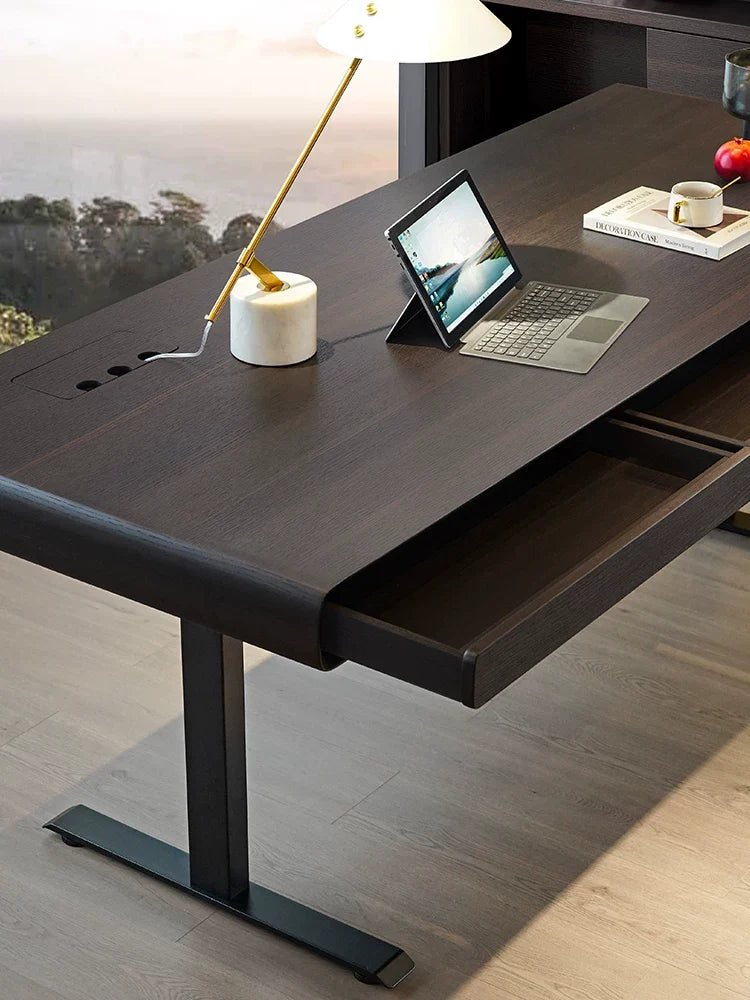 Close-up of modern standing desk desktop with cable management and drawer