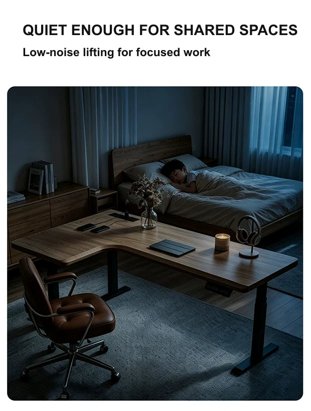 Quiet L-shaped electric standing desk in a bedroom office at night