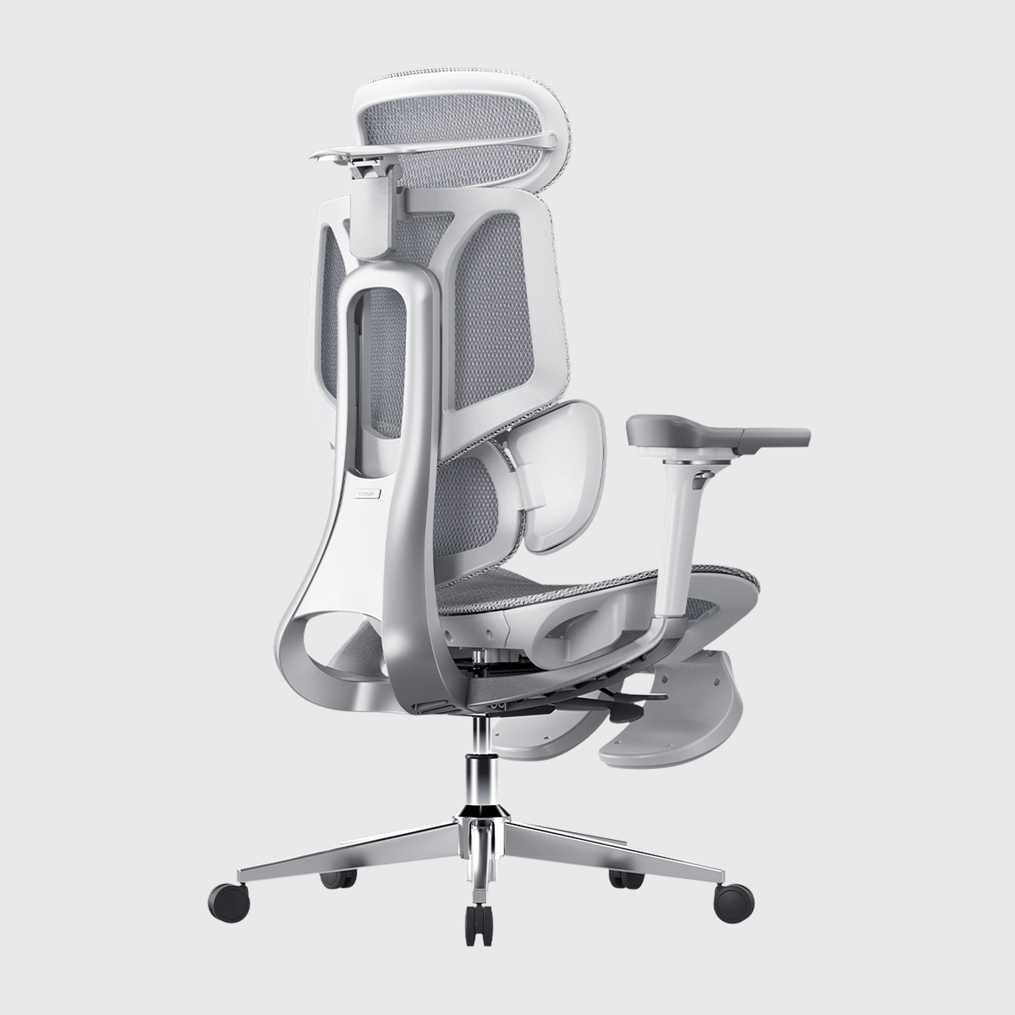 User taking a relaxing nap in a reclining ergonomic office chair with an extended footrest.