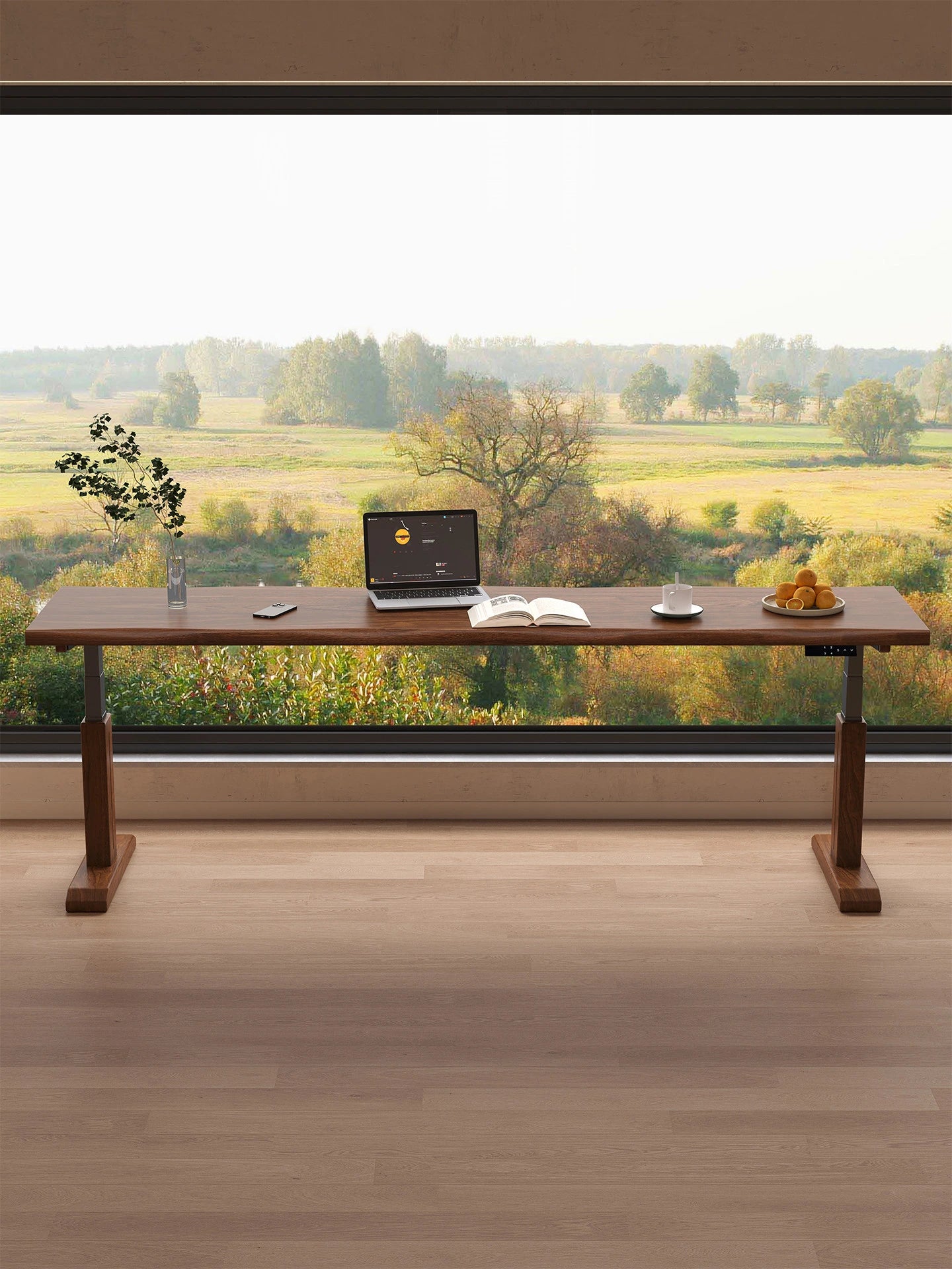 Wide solid wood height-adjustable desk viewed from the front