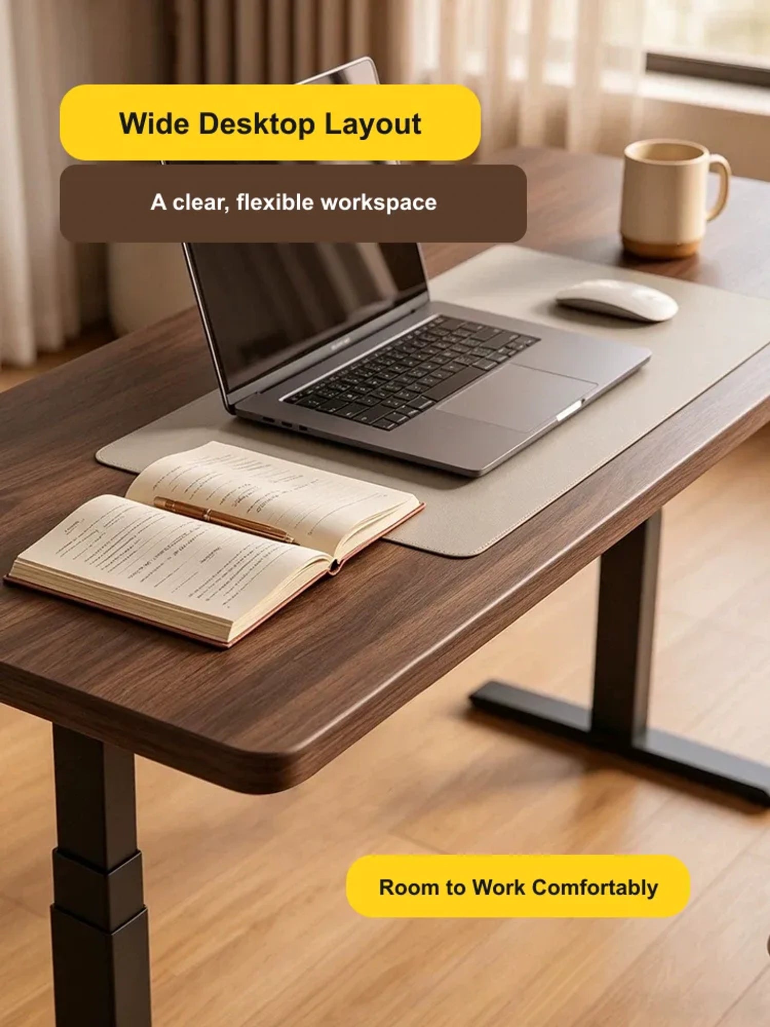 Wide solid wood standing desk desktop arranged for laptop work and everyday office tasks