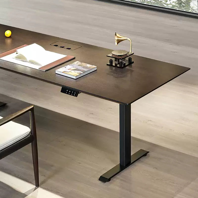 Standing desk desktop with integrated cable grommet viewed from above