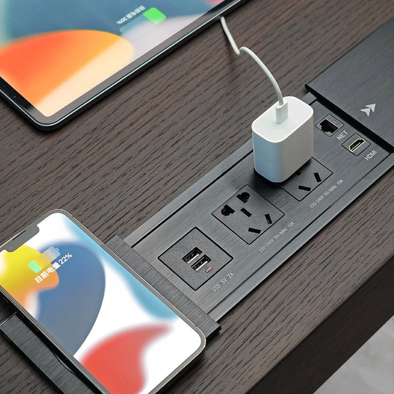 Electric standing desk desktop detail with cable management