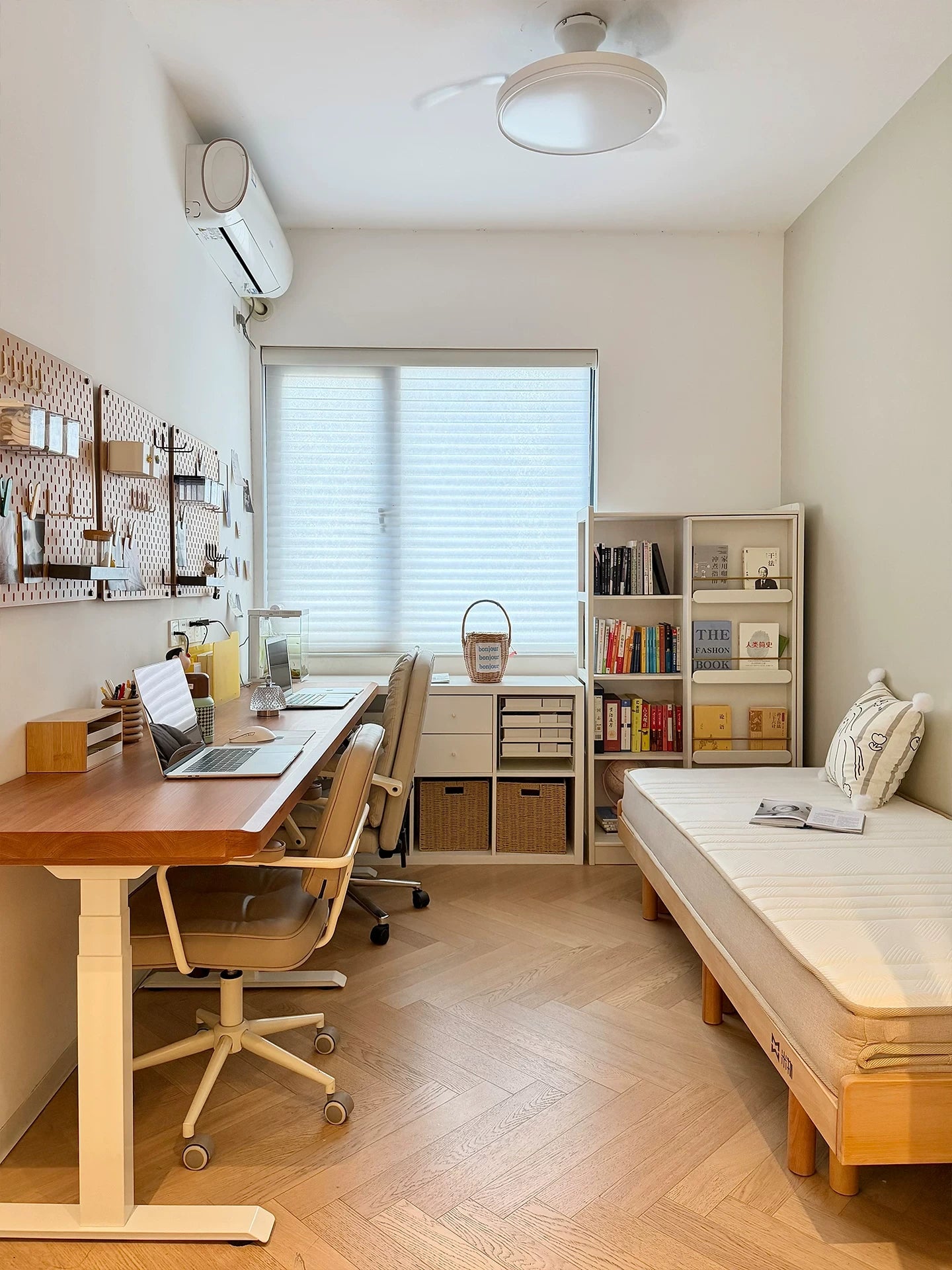 Three motor two person solid wood electric standing desk in a shared home office