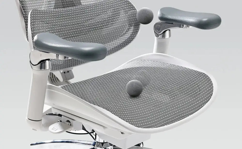 Ergonomic office chair providing adaptive spinal support during body movement.