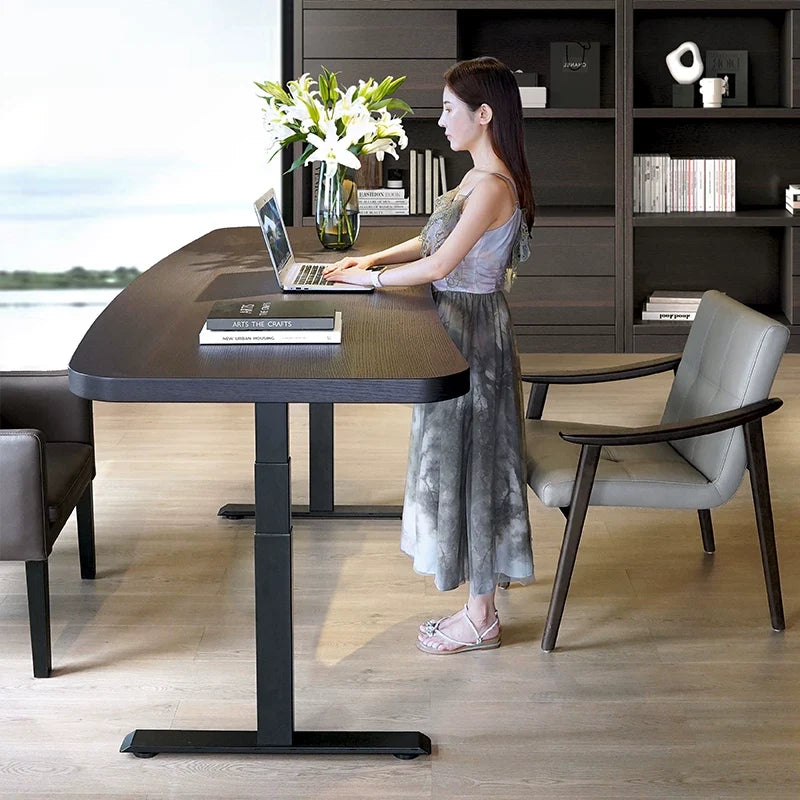 Dual-motor sit-stand desk raised for comfortable standing work