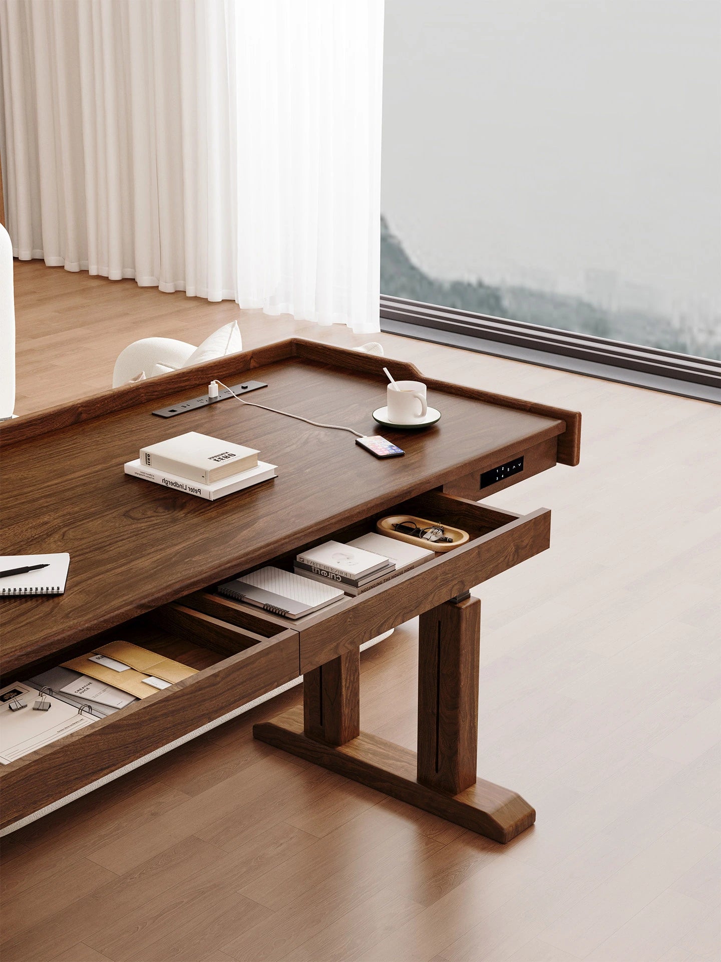 Wide electric standing desk configured as a spacious workstation